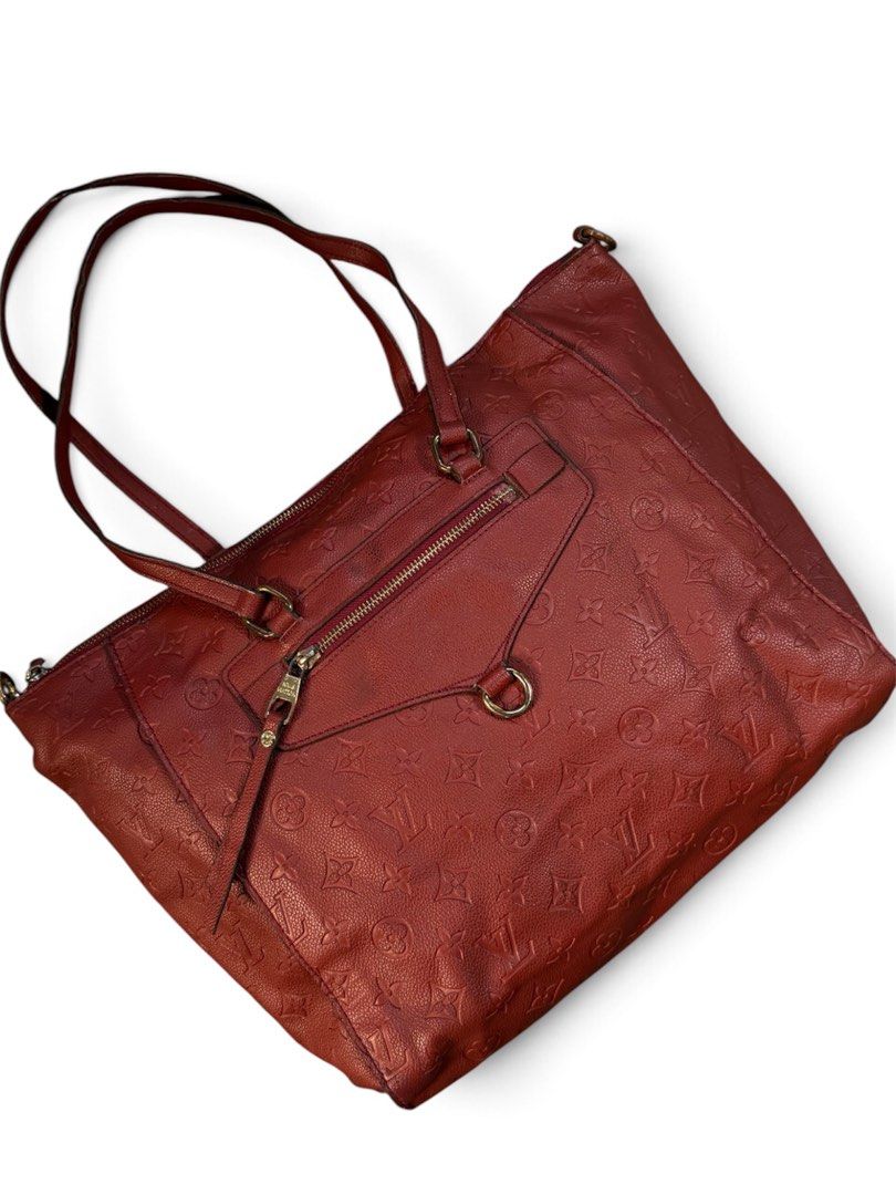 Louis Vuitton Monogram Empreinte Red Tote Bag (Category: Luxury Bags & Wallets) located in San Lorenzo. Submitted by thriftnigeorge (Listing ID 1465387764, Image 1). Description: WITH NUMBER CODE - Material: Premium leather with debossed monogram pattern COLOR RATE 9.7/10 MINOR SCRATCH ISSUE .