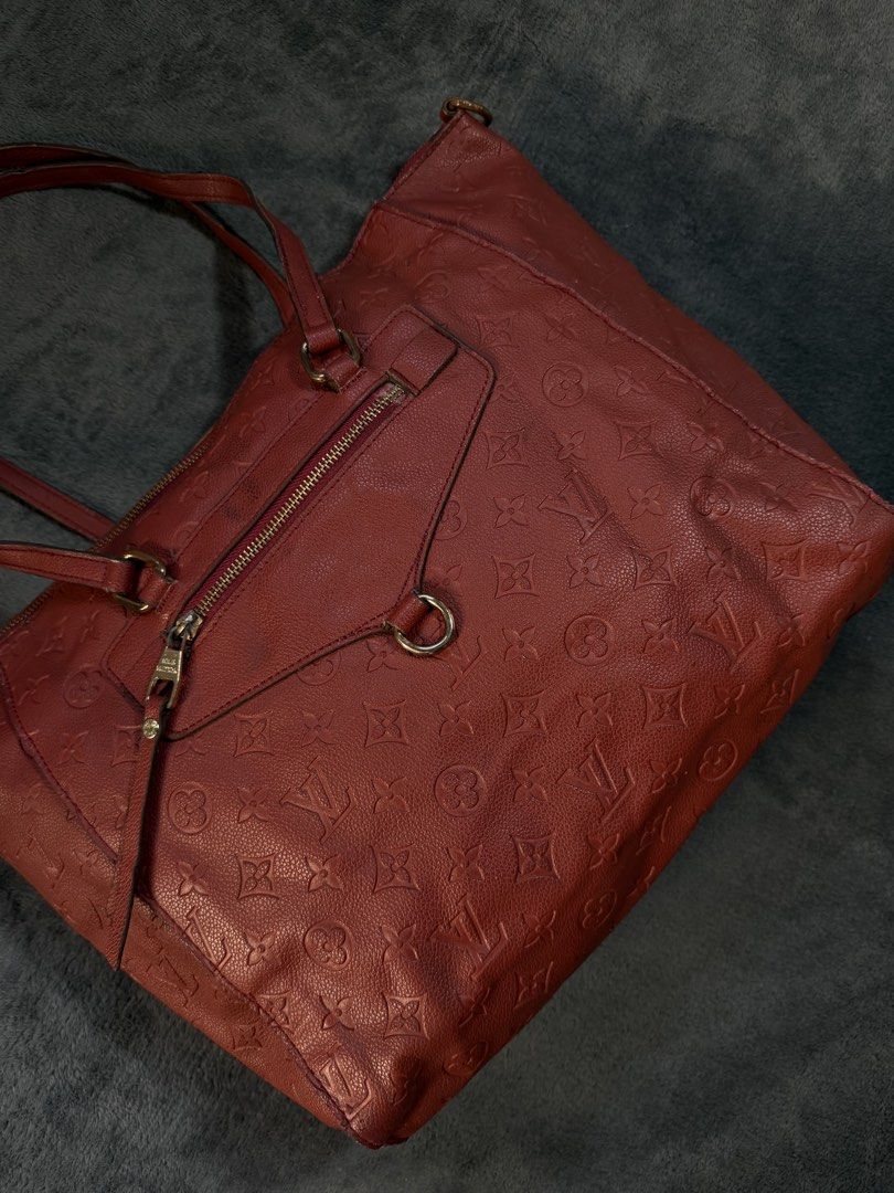 Louis Vuitton Monogram Empreinte Red Tote Bag (Category: Luxury Bags & Wallets) located in San Lorenzo. Submitted by thriftnigeorge (Listing ID 1465387764, Image 2). Description: WITH NUMBER CODE - Material: Premium leather with debossed monogram pattern COLOR RATE 9.7/10 MINOR SCRATCH ISSUE .