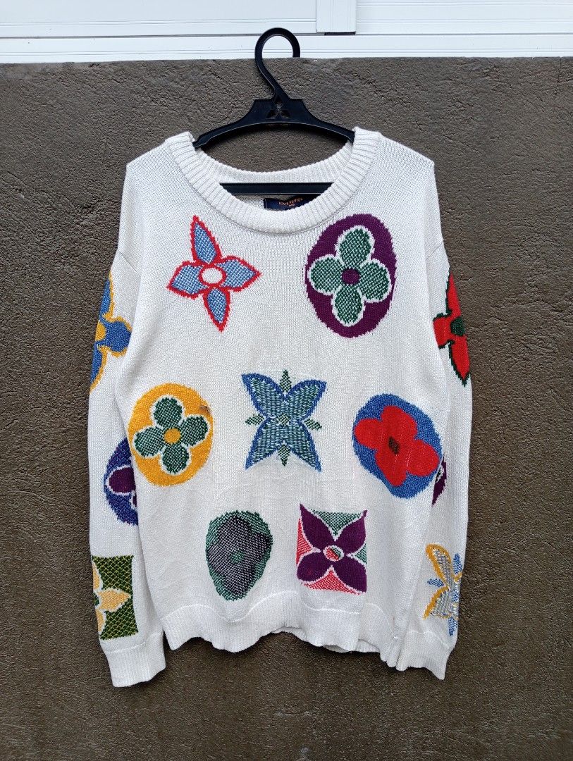 Louis Vuitton Multicolor Monogram Knit Sweater (Category: Longsleeves) located in Manila. Submitted by trifted.lootsph (Listing ID 1465396675, Image 1). Description: White knit sweater covered in colorful Louis Vuitton monogram flower graphics across the front and back. Long sleeves, ribbed crewneck, cuffs, and hem. Made in Italy tag at the inside collar. Soft woven texture throughout with vibrant multitone patterns. in excellent condition 9.8/10