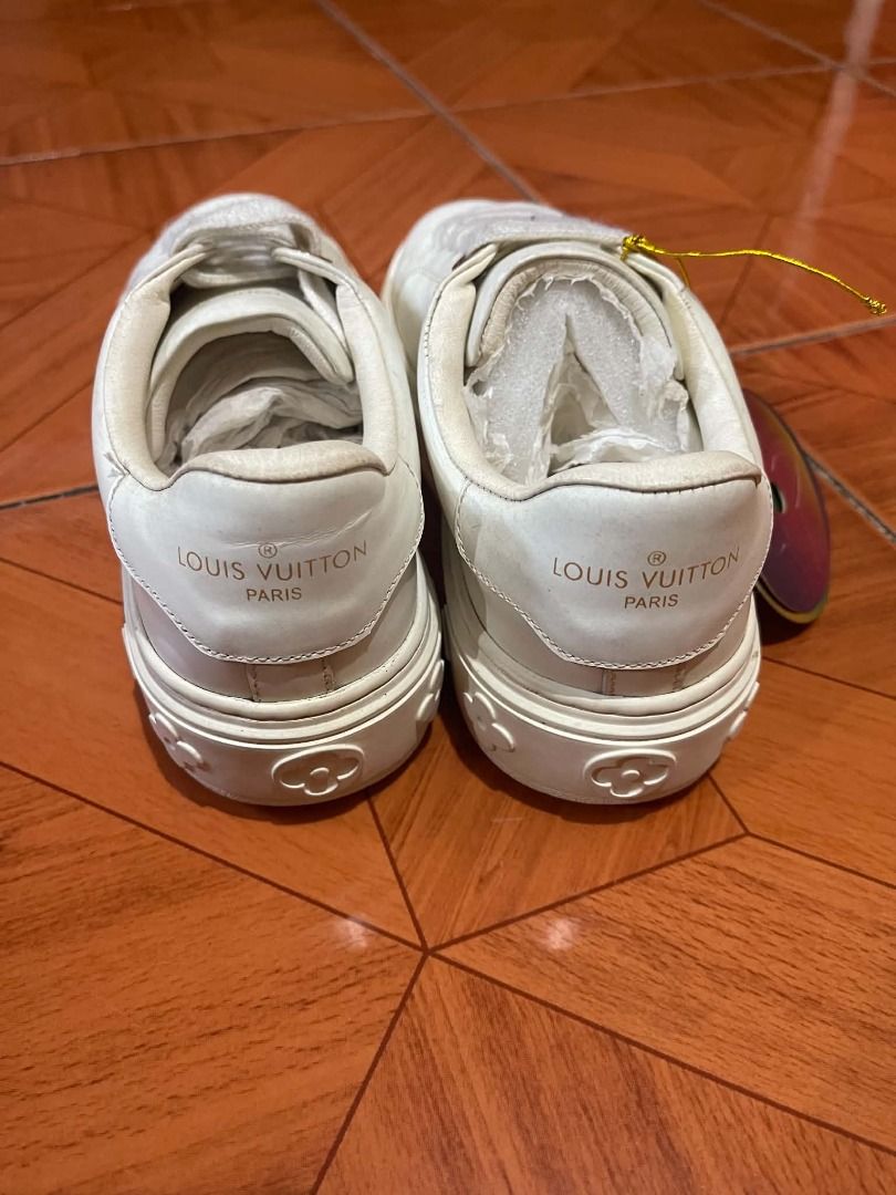 Louis Vuitton White Leather Sneakers Size 37 (Class A) (Category: Sneakers) located in Caloocan City. Submitted by kcprintshop01-88923 (Listing ID 1465397446, Image 1). Description: - Brand: Louis Vuitton - Color: White with gold-tone hardware - Size: 37 (stamped on midsole) - Material: Premium white leather - Design: Monogram flower motifs on the side and debossed LV Paris lettering on the heel tab - Sole: Thick white platform sole - Condition: 