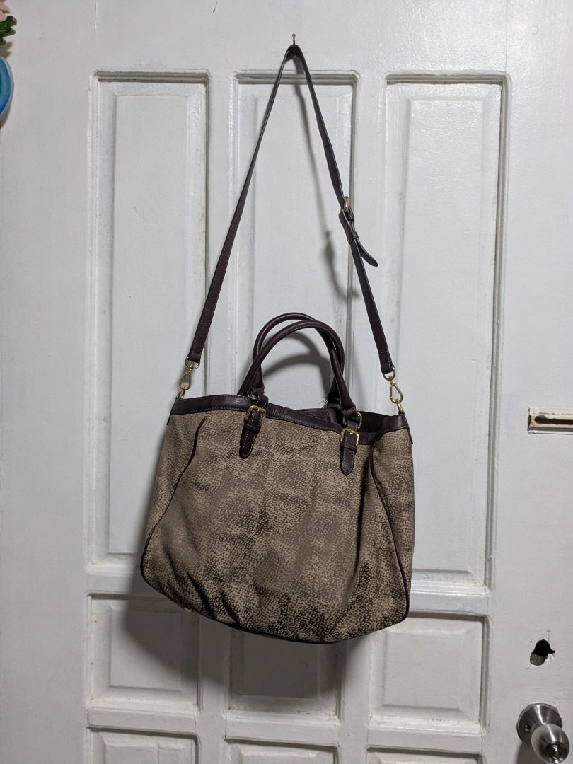 Lovcat Paris 2 Way Bag (Category: Shoulder Bags) located in Quezon City. Submitted by nnncorner (Listing ID 1465516696, Image 3). Description: Lovcat Paris Monogram Canvas 2 Way Bag Combination of Canvas and Leather 9/10 condition 100% Original! Good as new Complete Bag Feet Strap down to bottom - 32 inches Height - 12 inches Width - 17 inches Can be used as Hand Bag or Sling Bag Detachable Strap No tarnising on all gold hardwares Snap lock closu