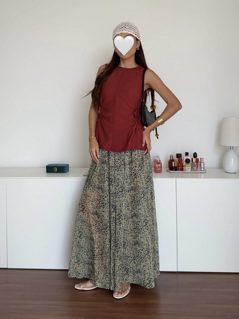 Love, Bonito Printed Maxi Flowy Skirt (Category: Skirts) located in Quezon City. Submitted by 2011mgt (Listing ID 1464861246, Image 2). Description: Love, Bonito printed maxi skirt in size M - 10/10 condition ⭐️ used once only to take pics! - bought for ₱3.9k in-store - Fit: Flowy maxi length with a comfy elastic waistband - Styling: Perfect for casual days or dressed up for a night out - Color/Pattern: Olive green with dark animal print tags: lo