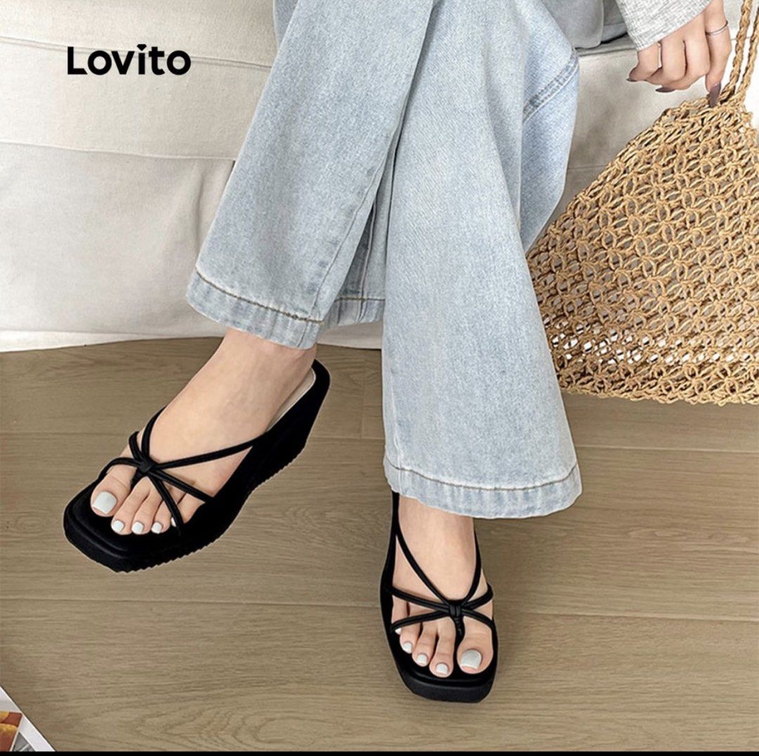 Lovito Black Square Toe Strappy Wedge Sandals (Category: Wedges) located in Manila. Submitted by _foryou (Listing ID 1465403546, Image 2). Description: - Brand: Lovito - Color: Black - Style: Strappy wedge sandals with slip-on design - Details: Square open toe and cute front knot detail - Heel: Chunky wedge for added height and comfort - Condition: Excellent, clean soles and insoles with no scuffs or marks - Photos: Real photos of the actual item