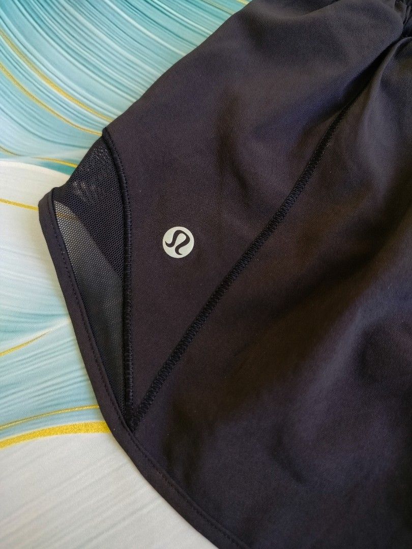 Lululemon Black Athletic Shorts Size 8 Regular (Category: Shorts) located in Manila. Submitted by gerald_quinto (Listing ID 1465479736, Image 2). Description: - Brand: Lululemon -Waist 26-34 - Style: Athletic shorts / Running shorts - Color: Solid Black - Size: 8 (Regular fit) - Waistband: Comfortable elastic - Details: Breathable mesh side panels near the hem, iconic silver Lululemon logo on the left leg - Material: Lightweight and breathable, p