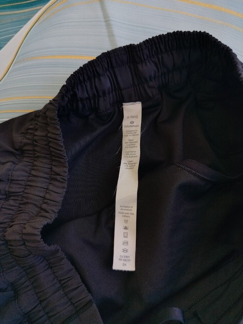 Lululemon Black Athletic Shorts Size 8 Regular (Category: Shorts) located in Manila. Submitted by gerald_quinto (Listing ID 1465479736, Image 3). Description: - Brand: Lululemon -Waist 26-34 - Style: Athletic shorts / Running shorts - Color: Solid Black - Size: 8 (Regular fit) - Waistband: Comfortable elastic - Details: Breathable mesh side panels near the hem, iconic silver Lululemon logo on the left leg - Material: Lightweight and breathable, p