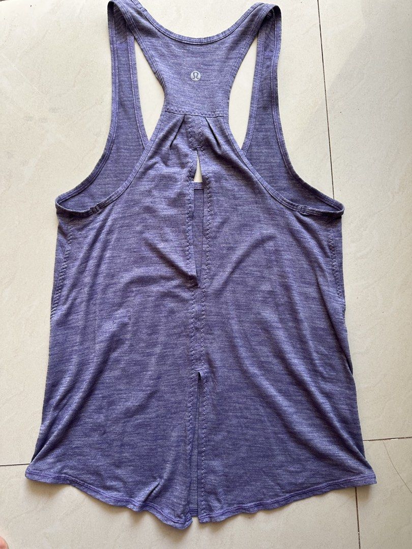 Lululemon Purple Racerback Workout Tank Top (Category: Activewear) located in Rosales. Submitted by dariang22 (Listing ID 1465389796, Image 1). Description: Size 4 on removed tag.