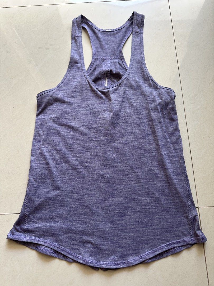 Lululemon Purple Racerback Workout Tank Top (Category: Activewear) located in Rosales. Submitted by dariang22 (Listing ID 1465389796, Image 2). Description: Size 4 on removed tag.
