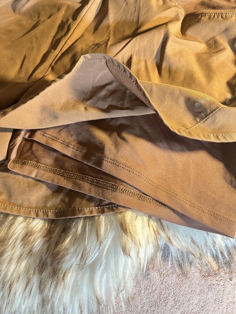 Lululemon Running Shorts Brown Medium (Category: Shorts) located in Las Pinas. Submitted by francesaly (Listing ID 1465385396, Image 3). Description: - Brand: Lululemon - Color: Rich brown - Condition: Great, barely worn - Fit & Comfort: High waistband with built-in liner and super lightweight fabric - Features: Secure back pocket and reflective dots near the hem for visibility - Ideal for: Running, workouts, or everyday lounging.