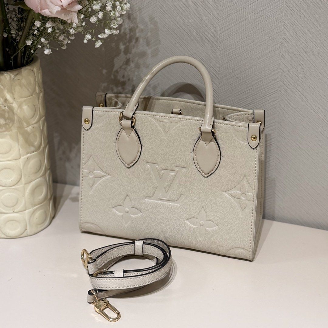 LV On-The-Go PM Bag (Category: Luxury Bags & Wallets) located in Taguig. Submitted by prelovedbyprei (Listing ID 1465410386, Image 2). Description: LV OnTheGo PM Bag ~ small size ~ used once for an event only ~ bought in bangkok for ₱12,000 ~ top notch quality ₱5,000 negotiable.