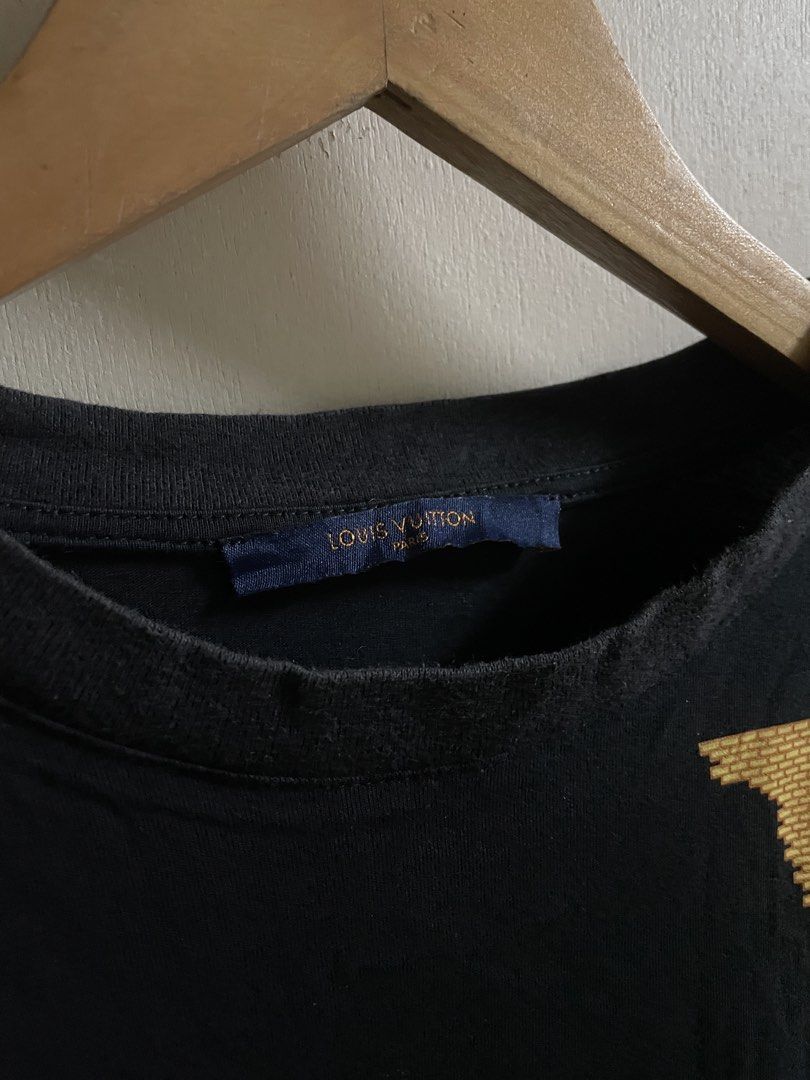 LV tee (Category: Luxury Apparel) located in Las Pinas. Submitted by mnl.streetwear.ph (Listing ID 1465529348, Image 2). Description: • Lv tee Size Medium 20/24 dimes.