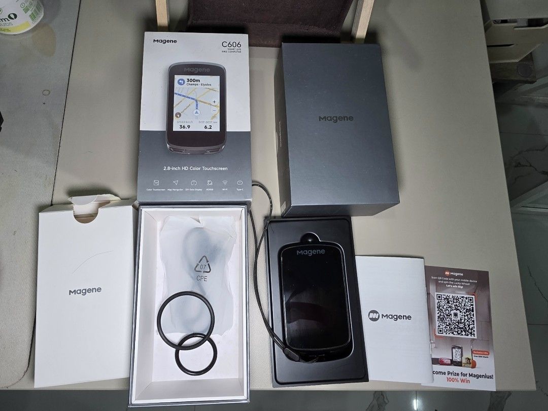 Magene C606 Smart GPS Bike Computer (Category: Bicycles) located in Las Pinas. Submitted by rapidecluts (Listing ID 1465490620, Image 3). Description: - Model: Magene C606 Smart GPS Bike Computer - Condition: Unboxed unit, screen turns on and displays phone pairing QR code - Display: 2.8-inch HD color touchscreen with map navigation - Connectivity & Charging: Wi-Fi enabled with Type-C charging - Inclusions: Original packaging, mounting bands, man