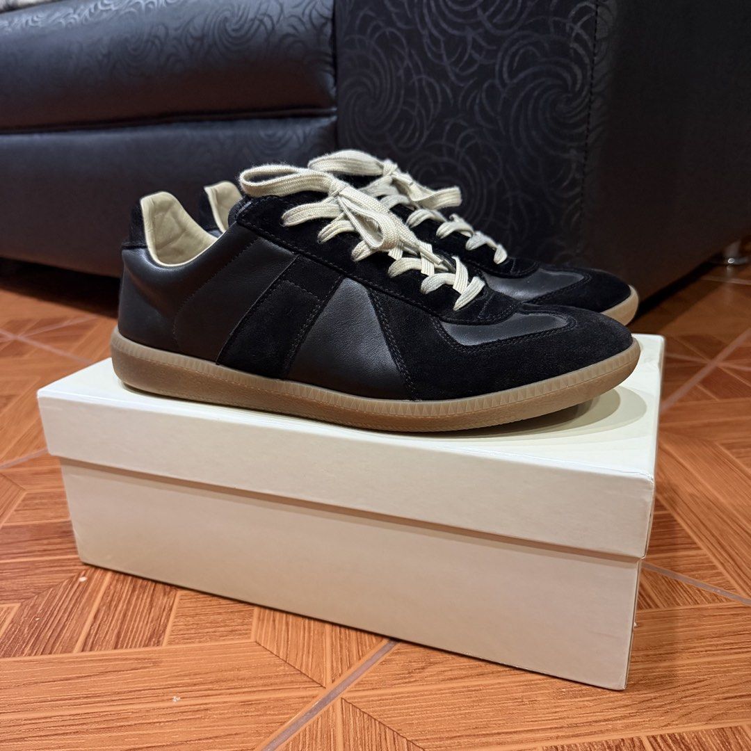 Maison Margiela gats (black) (Category: Sneakers) located in Manila. Submitted by ihatestars (Listing ID 1465473697, Image 1). Description: MVT gats used 4x max issue: no insoles, forgot where i put it size 46/12 fits 11.5-12us bc of no insoles if u buy a replacement insole it would fit 11us.