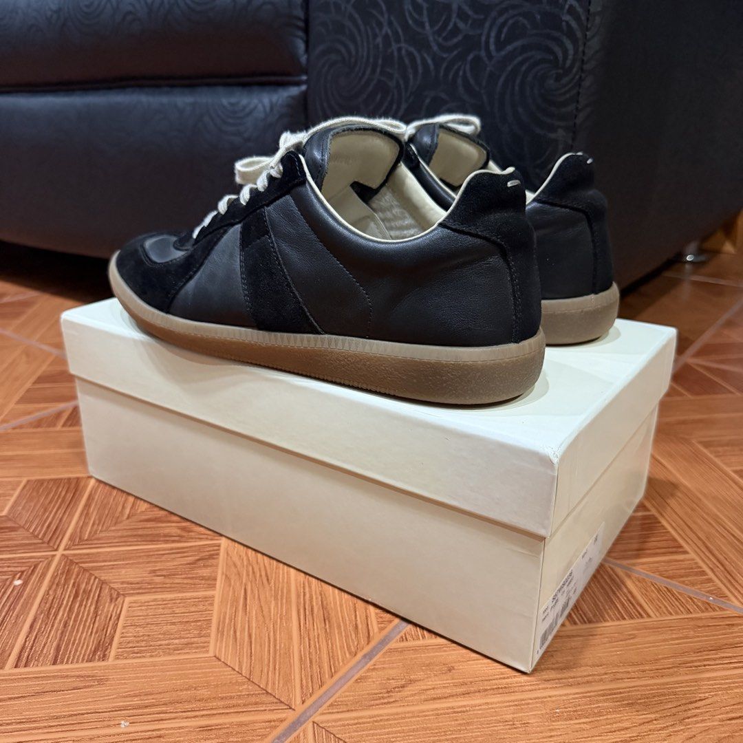 Maison Margiela gats (black) (Category: Sneakers) located in Manila. Submitted by ihatestars (Listing ID 1465473697, Image 3). Description: MVT gats used 4x max issue: no insoles, forgot where i put it size 46/12 fits 11.5-12us bc of no insoles if u buy a replacement insole it would fit 11us.
