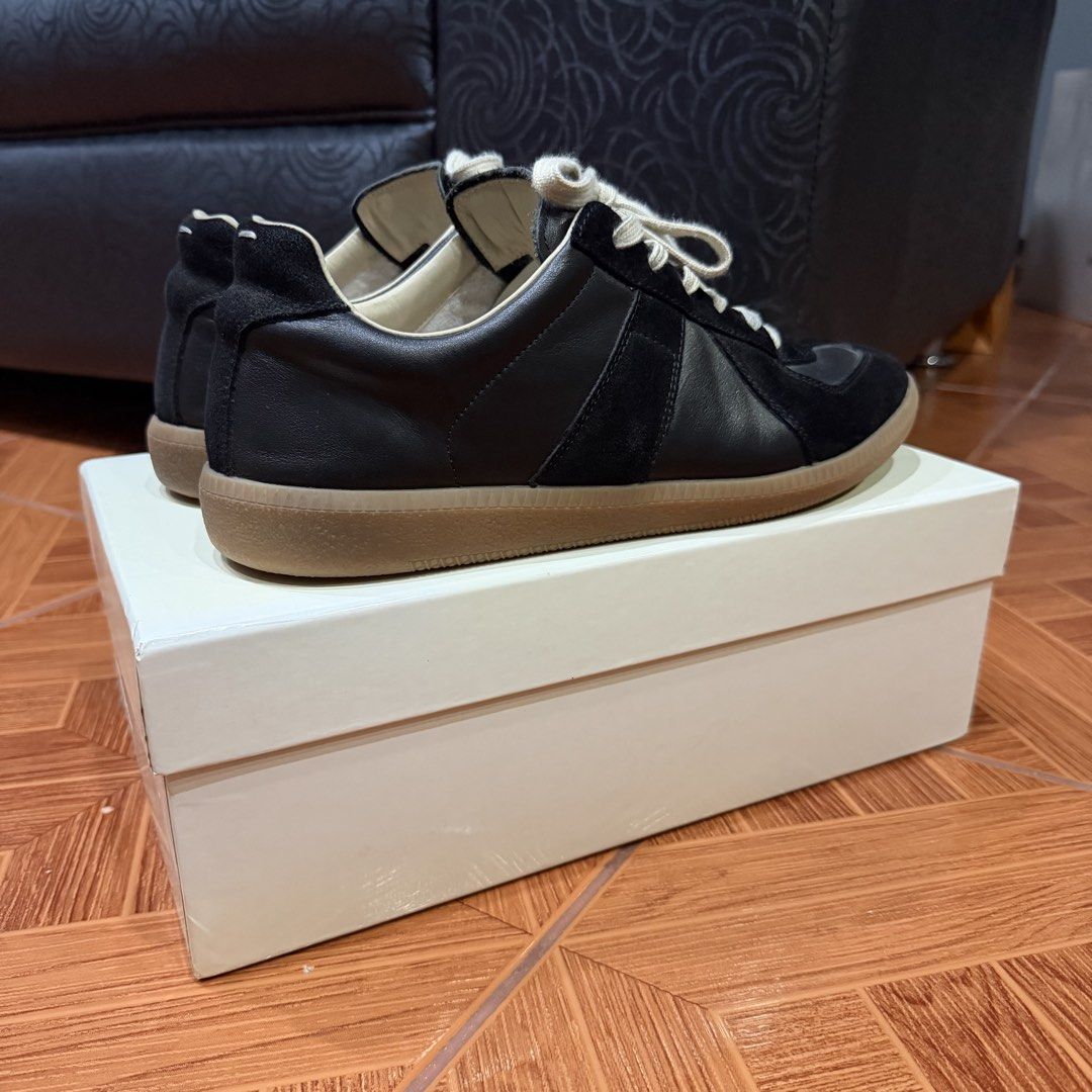 Maison Margiela gats (black) (Category: Sneakers) located in Manila. Submitted by ihatestars (Listing ID 1465473697, Image 2). Description: MVT gats used 4x max issue: no insoles, forgot where i put it size 46/12 fits 11.5-12us bc of no insoles if u buy a replacement insole it would fit 11us.