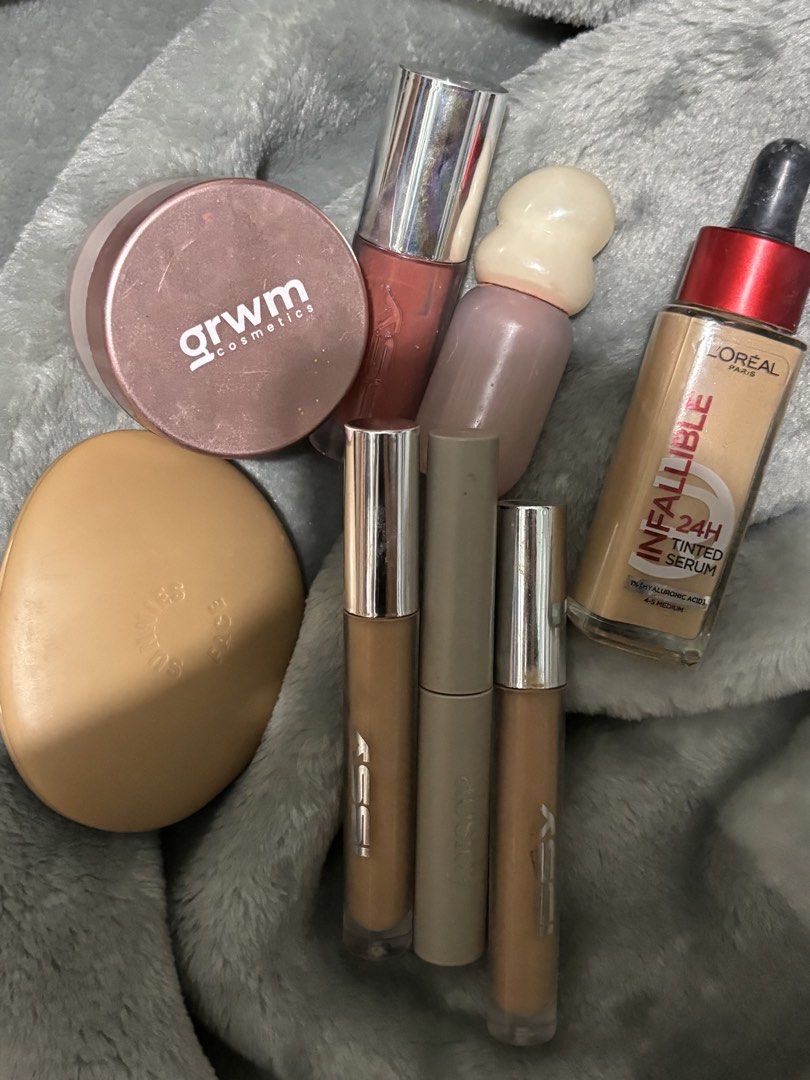 Makeup bundle - L'Oreal, GRWM, Sunnies Face, Issy, NYX (Category: Makeup) located in Urdaneta. Submitted by wishingunwell (Listing ID 1465488748, Image 2). Description: Clearing out my makeup stash. Bundle includes L'Oreal Infallible 24H tinted serum in 4-5 Medium, GRWM Bright N' Pink loose powder, Sunnies Face powder blush in Poodle (SGG02), and multiple Issy products including concealer tubes and a lip product. Most items tested or used lightly