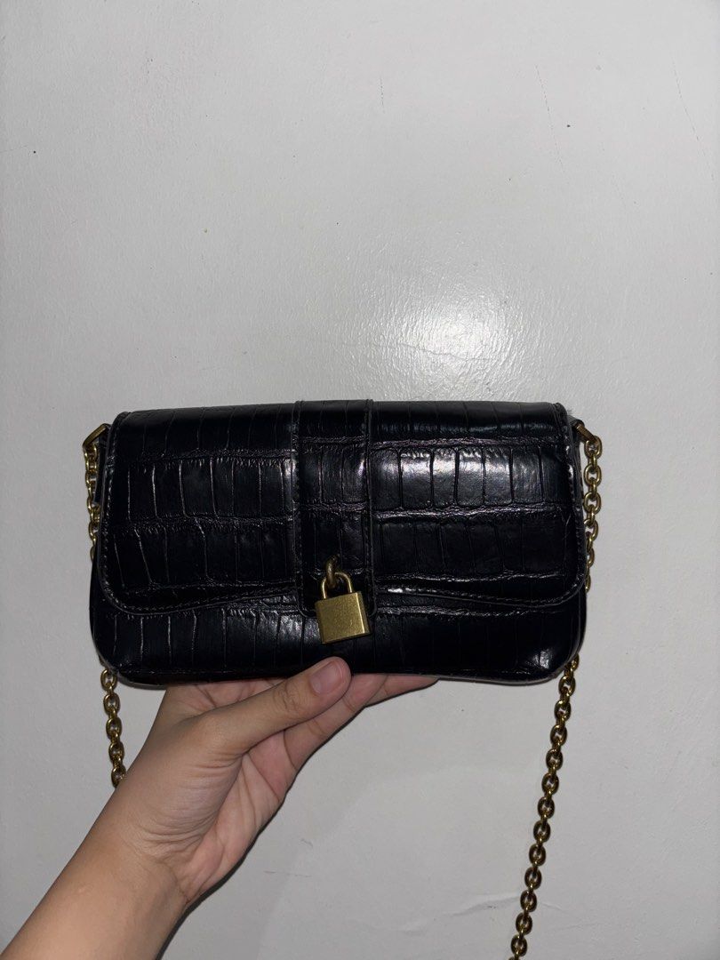 Mango Black Crocodile Textured Shoulder Bag Gold Chain (Category: Shoulder Bags) located in Dumaguete. Submitted by shopcee (Listing ID 1465515152, Image 1). Description: MANGO Sling bag.