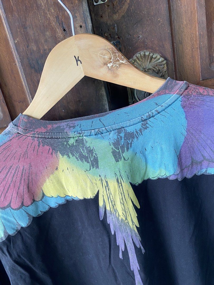 Marcelo burlon (Category: Tshirts & Polo Shirts ) located in Jaen. Submitted by oshimamark58418 (Listing ID 1465477302, Image 3). Description: - Brand: Marcelo Burlon County of Milan - Style: Iconic multi-color wing graphic print on black t-shirt - Size: Medium Dimes 19x27 - Condition: Good pre-owned condition, clean and well-kept - Ideal for streetwear, casual wear, and daily outfits.