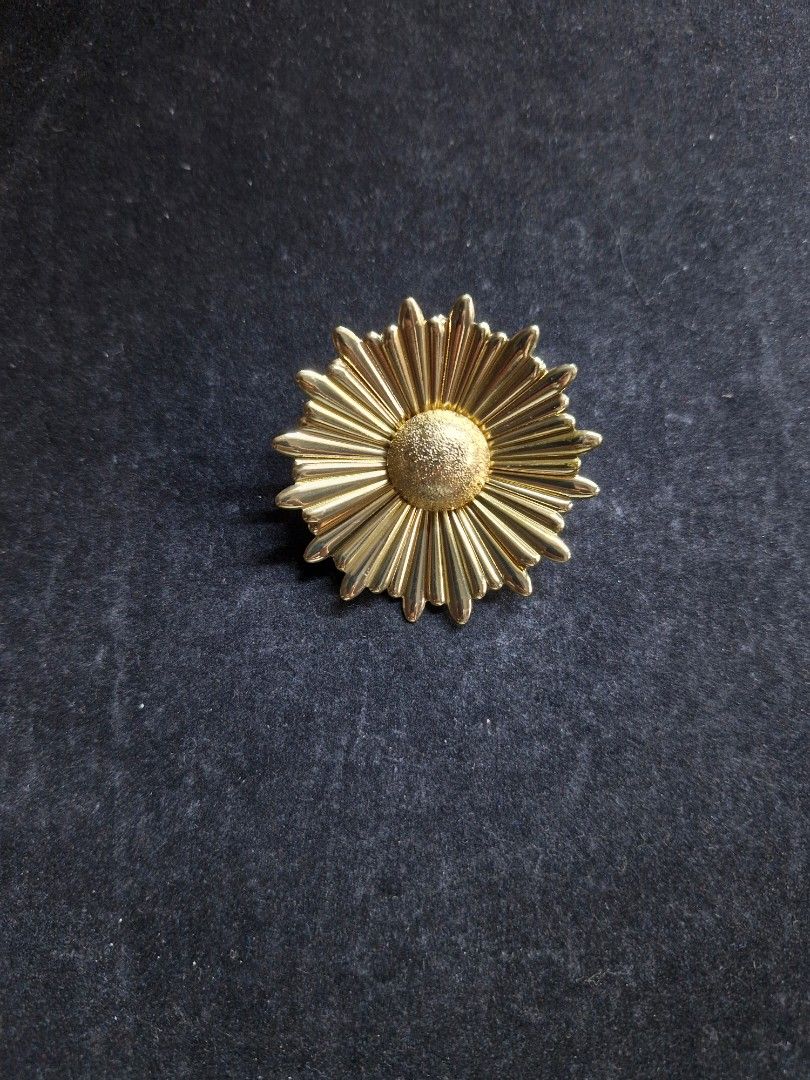 Marigold Brooch (Category: Brooches) located in Taguig. Submitted by mommaschoice (Listing ID 1465520345, Image 1). Description: Brand New Beautifully crafted design Gold-Tone finish Lightweight won't damage the fabric Ships nationwide.