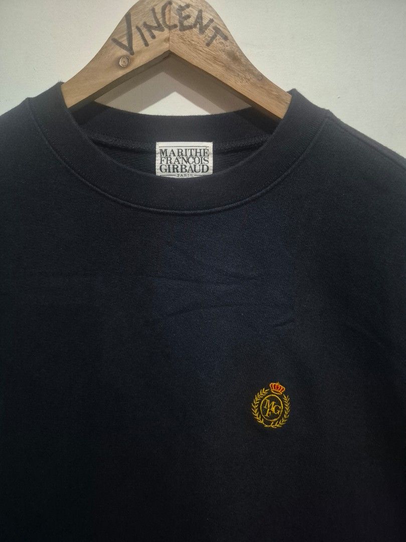Marithe Francois Girbaud Black Crewneck Sweatshirt XL (Category: Coats, Jackets and Outerwear) located in Bulacan. Submitted by vince4593 (Listing ID 1465444192, Image 2). Description: - Brand: Marithe Francois Girbaud - Color: Solid black - Size: XL (Relaxed fit) - Material: 100% cotton - Design: Classic crewneck with small embroidered chest logo - Condition: Clean interior labels and wash tags intact - Perfect for a comfortable everyday pullove