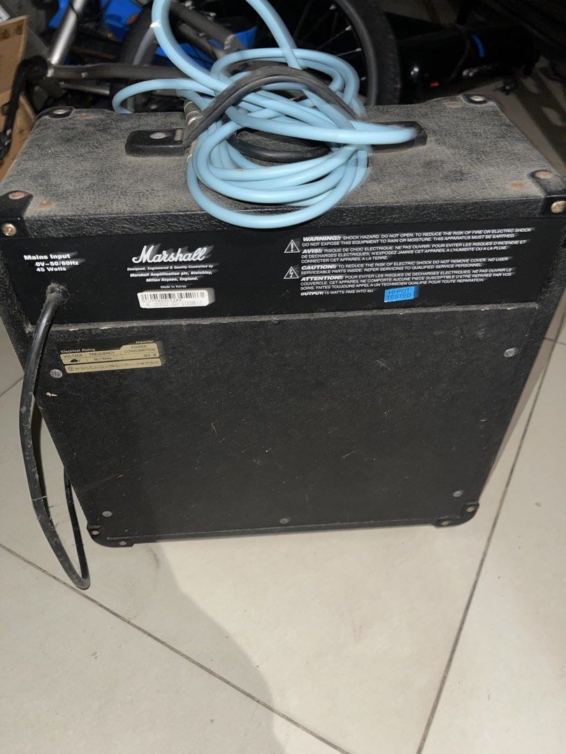 Marshall MG15CDR Guitar Amplifier with Fender Cable (Category: Soundbars, Speakers & Amplifiers) located in Mandaluyong City. Submitted by lluisl (Listing ID 1465459642, Image 2). Description: - Brand/Model: Marshall MG15CDR Guitar Amp (45 Watts) - Condition: Working, powers up fine (dusty from storage, needs a quick wipe down) - Features: Clean and overdrive channels, built-in reverb, headphone jack, and line out - Includes: Attached standard po