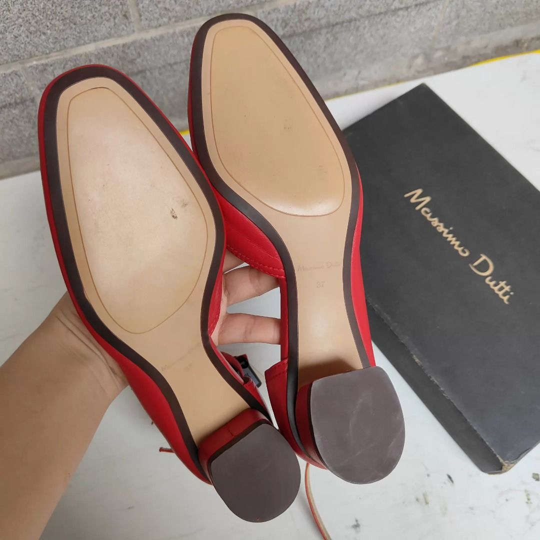 Massimo Dutti Sandals EU 37 | MD-1041532345279 (Category: Heels) located in Paranaque City. Submitted by silverphoenix.00302e (Listing ID 1465448528, Image 3). Description: - Brand: Massimo Dutti - Size: EU 37 - Material: Bright red leather - Style: Chunky low heel with ankle strap - Packaging: Comes with original black shoebox - Condition: Minor peeling inside near the brand tag (see photos); soles and heels show minimal wear.