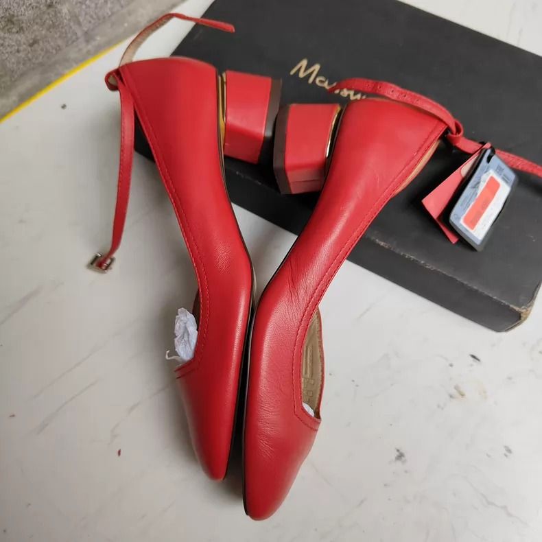 Massimo Dutti Sandals EU 37 | MD-1041532345279 (Category: Heels) located in Paranaque City. Submitted by silverphoenix.00302e (Listing ID 1465448528, Image 2). Description: - Brand: Massimo Dutti - Size: EU 37 - Material: Bright red leather - Style: Chunky low heel with ankle strap - Packaging: Comes with original black shoebox - Condition: Minor peeling inside near the brand tag (see photos); soles and heels show minimal wear.