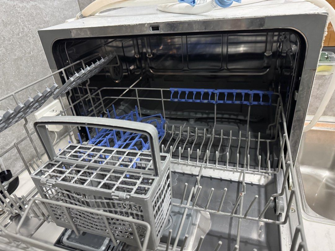 Maximus table top dishwasher (Category: Dishwasher) located in Paranaque City. Submitted by abigaylerocks (Listing ID 1465518280, Image 3). Description: Color: White (with wood handle) 6 place settings (European standard) 6 dinner plates, 6 soup plates, 6 dessert plates, 6 glasses, 6 tea cups, 6 saucers, 6 forks, 6 soup spoons, 6 dessert spoons, 6 teaspoons, 6 knives, 1 oval platter, 1 serving spoon, 1 gravy ladle, 1 serving fork Plug-and-play in