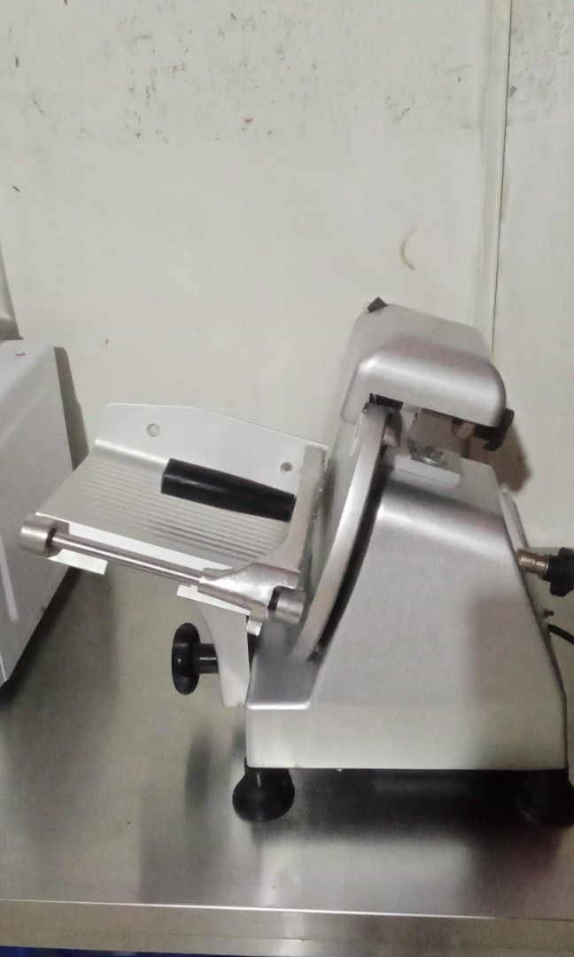 Meat slicer (Category: Construction Tools & Equipment) located in Taguig. Submitted by noble_cathy (Listing ID 1465411588, Image 3). Description: Semi authentic meat slicer Note: used 4months old . Rfs. Need to upgrade.