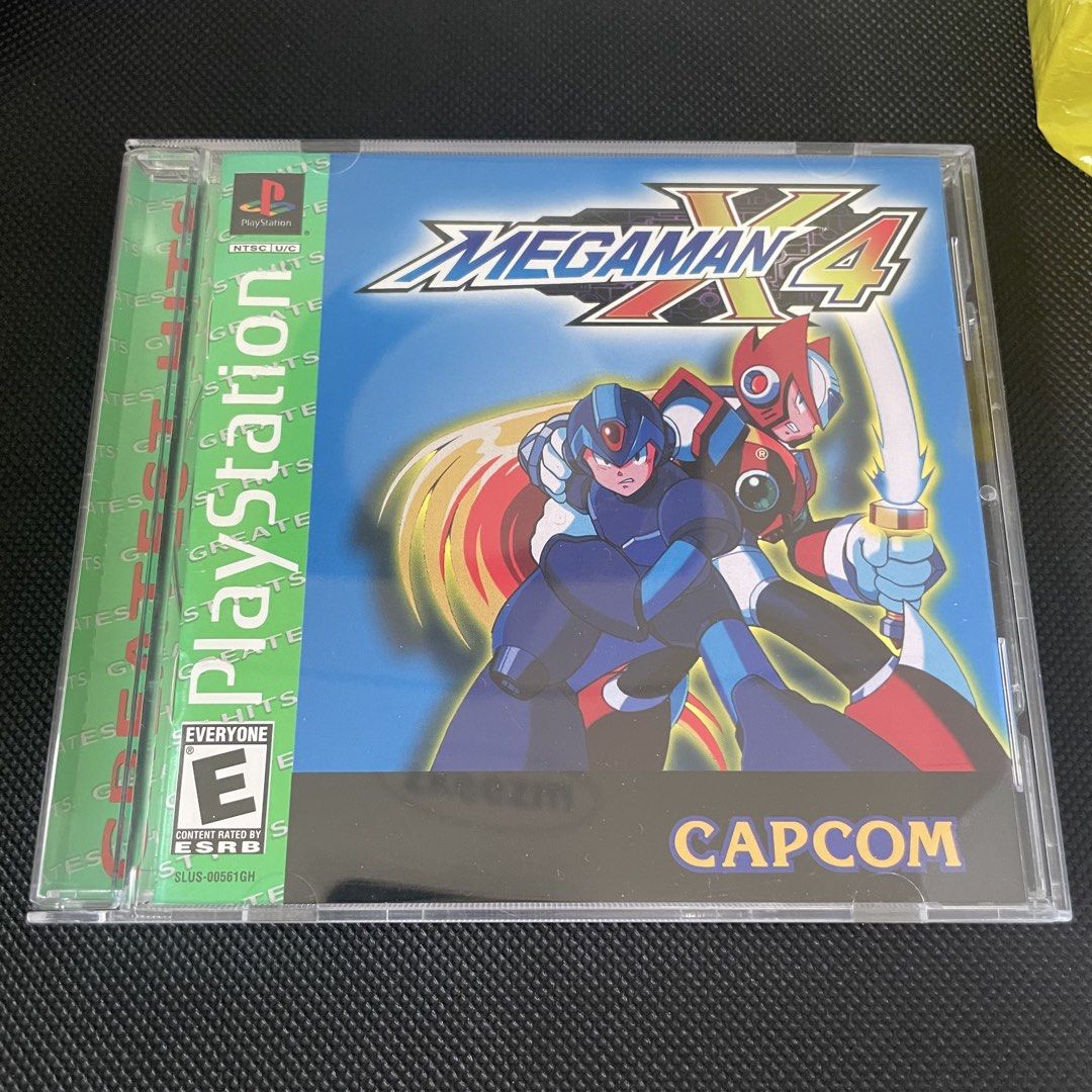 Mega Man X4 PlayStation Greatest Hits PS1 (Category: PlayStation) located in Mandaluyong City. Submitted by akihabara48 (Listing ID 1465401055, Image 1). Description: Near Mint Condition Hairline scratches on the disc but doesnt affect gameplay - Title: Mega Man X4 - Platform: PlayStation (PS1) - Version: Greatest Hits (NTSC-U/C) - Inclusions: Original jewel case, front cover art, and manual - Publisher: Capcom - ESRB Rating: E for Everyone.