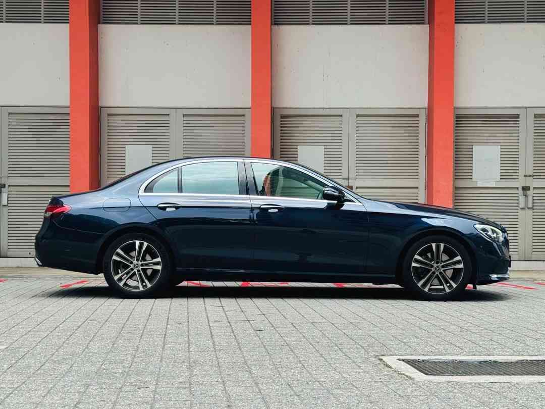 Mercedes-Benz E-Class Saloon E200 Avantgarde (A) (Category: Used Cars) located in Singapore. Submitted by carbuyersclub (Listing ID 1465438214, Image 2). Description: CarBuyers Club - 550+ Google Reviews, SGCM Premium Dealer 2026! Newly arrived C&C agent unit, premium German sedan! Fully agent maintained since day 1 with 2 more free servicing to go! Extremely low mileage used! Classy metallic Brilliant Blue bodywork against tan leather upholstery