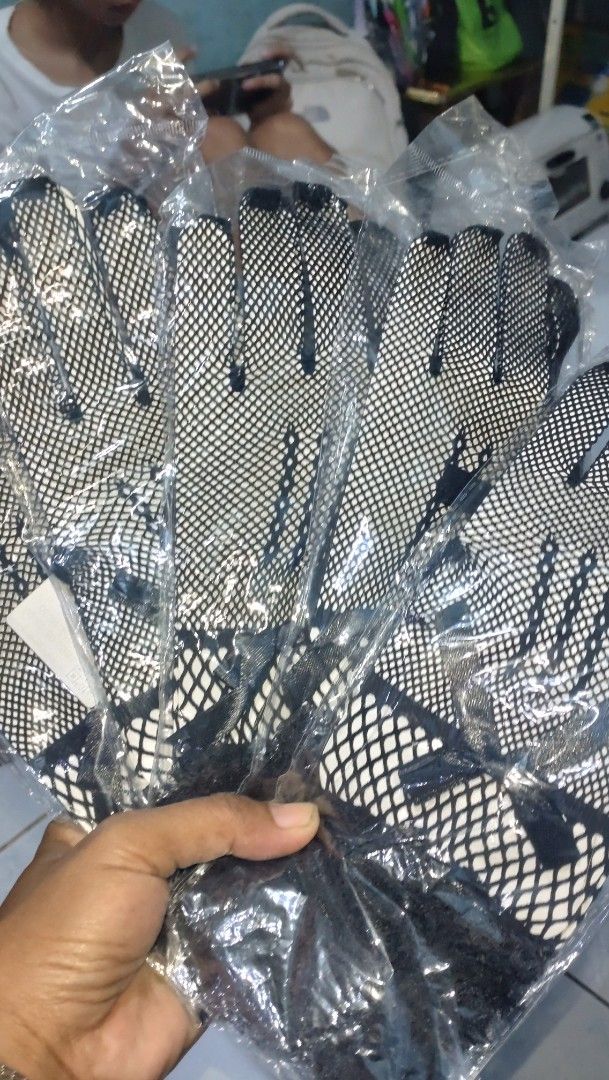 Mesh gloves lace 5pair (Category: Gloves) located in Valenzuela. Submitted by diane.35 (Listing ID 1465492371, Image 3). Description: - Style: Five-finger black fishnet gloves with patterned mesh - Accents: Cute small black bow and delicate ruffle lace trim at the wrist - Condition: Brand new, each pair comes in individual plastic packaging - Availability: Multiple pairs in stock, perfect for concerts, parties, or everyday edgy fashion!.