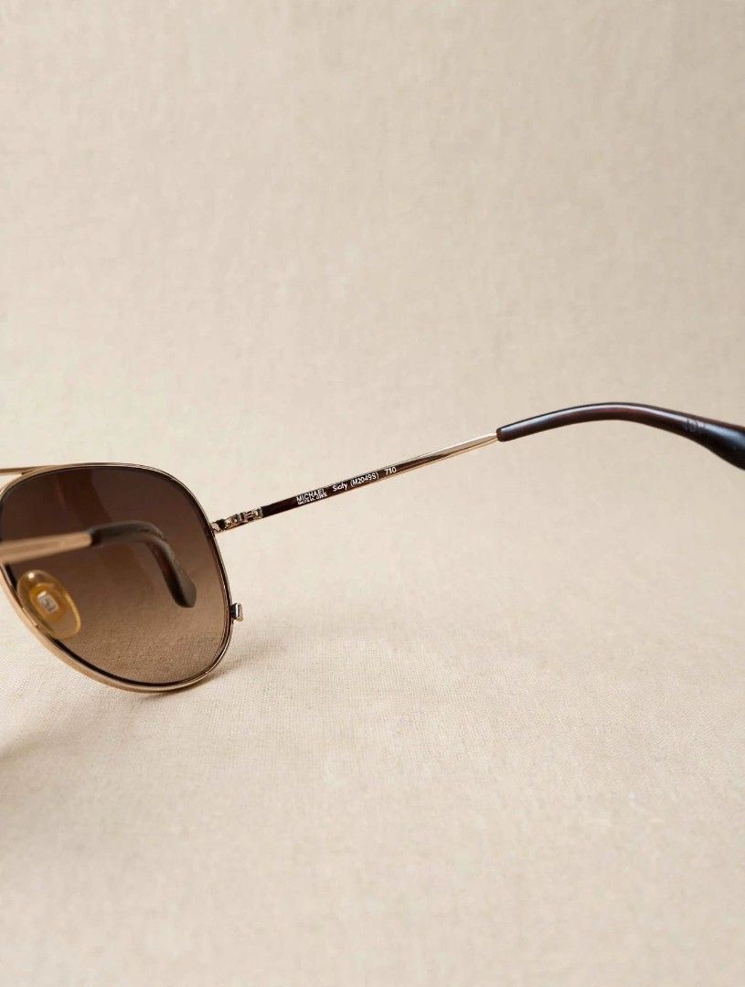 Michael kors (Category: Sunglasses & Eyewear) located in Cabanatuan. Submitted by peach_cams (Listing ID 1465412023, Image 3). Description: ✨ PRE-LOVED: Michael Kors Sicily Aviator Sunglasses (M2045S) ✨ Get instant glam with this classic oversized aviator style from Michael Kors! Brand/Model: Michael Kors Sicily M2045S Style: Gold-tone frame with gradient brown lenses Condition: Pre-owned / Second hand (Good condition, minimal signs of use) 📩 Se
