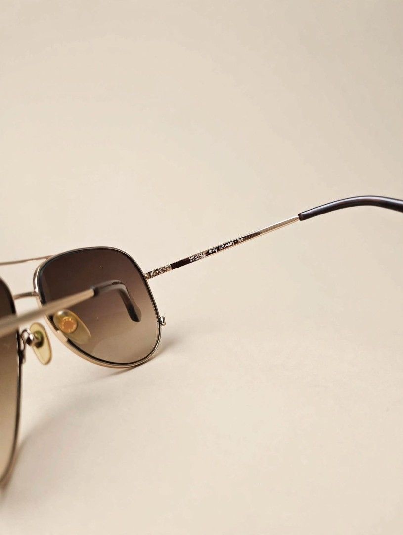 Michael kors (Category: Sunglasses & Eyewear) located in Cabanatuan. Submitted by peach_cams (Listing ID 1465412023, Image 2). Description: ✨ PRE-LOVED: Michael Kors Sicily Aviator Sunglasses (M2045S) ✨ Get instant glam with this classic oversized aviator style from Michael Kors! Brand/Model: Michael Kors Sicily M2045S Style: Gold-tone frame with gradient brown lenses Condition: Pre-owned / Second hand (Good condition, minimal signs of use) 📩 Se