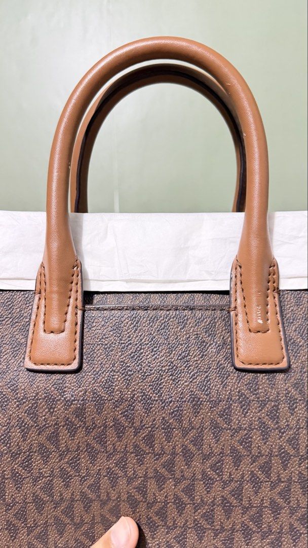 Michael Kors Avril Small Satchel Monogram (Category: Luxury Bags & Wallets) located in Muntinlupa City. Submitted by sheesbeauty (Listing ID 1465531918, Image 3). Description: Lightly used Visible signs of usage on leather parts. See attached photos. With care card No dust bag RFS: Decluttering.