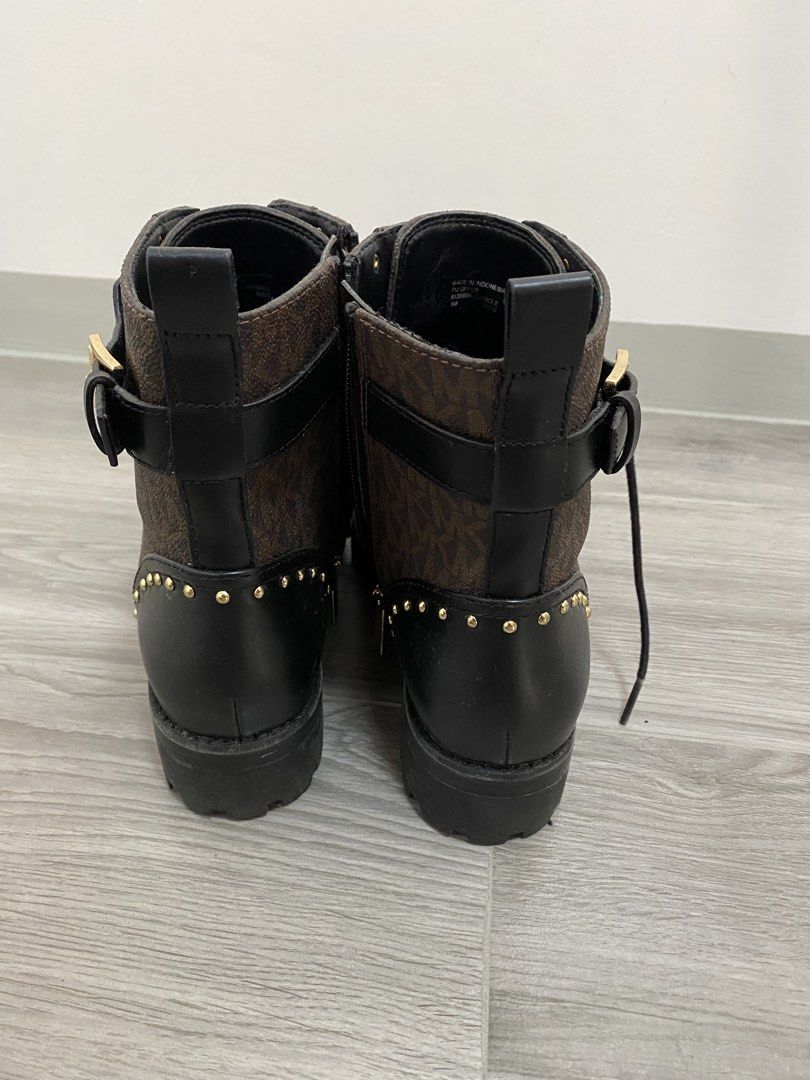 Michael Kors Brown Logo Combat Boots with Gold Hardware (Category: Boots) located in Trece Martires City. Submitted by miladyoo9 (Listing ID 1465465413, Image 3). Description: - Brand: Michael Kors - Style: Combat Boots - Size: 8 - Color/Pattern: Brown monogram with black leather trim - Details: Gold studs, large front MK hardware, side zippers with MK pull tabs - Soles: Lug soles for extra grip and traction - Condition: Excellent buyer-ready con