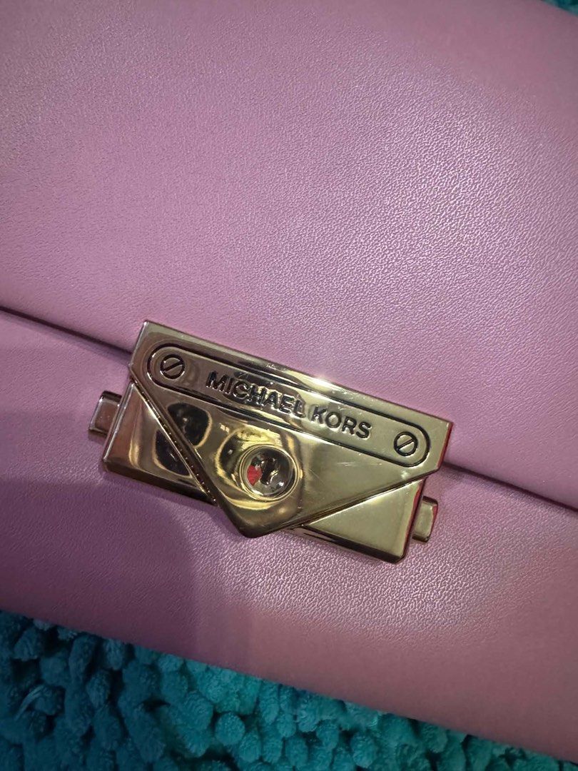 Michael Kors Cece Small Conv Flap Xbody Primrose (Category: Luxury Bags & Wallets) located in Manila. Submitted by belle_gray (Listing ID 1465512384, Image 2). Description: - Brand: Michael Kors Cece Convertible Crossbody - Color: Primrose Pink - Material: Premium vegan leather with gold-tone hardware - Closure: Secure envelope lock - Strap: Versatile chain and leather strap - Inclusions: Brand new with $448 store tag, care card, and original MK 
