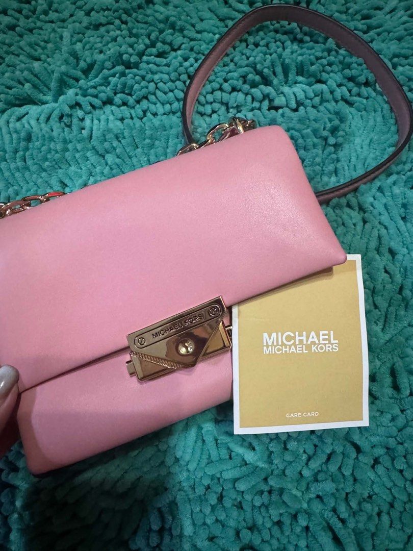 Michael Kors Cece Small Conv Flap Xbody Primrose (Category: Luxury Bags & Wallets) located in Manila. Submitted by belle_gray (Listing ID 1465512384, Image 1). Description: - Brand: Michael Kors Cece Convertible Crossbody - Color: Primrose Pink - Material: Premium vegan leather with gold-tone hardware - Closure: Secure envelope lock - Strap: Versatile chain and leather strap - Inclusions: Brand new with $448 store tag, care card, and original MK 