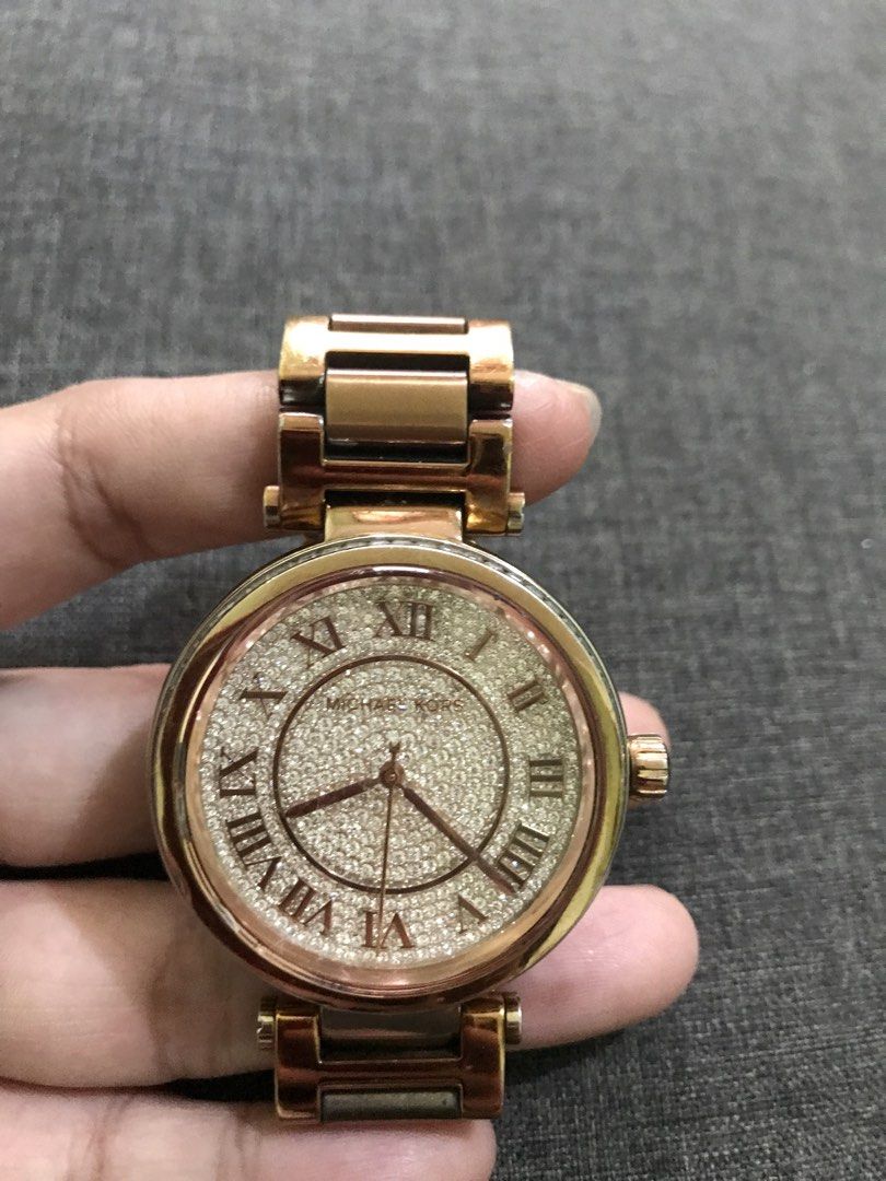 Michael Kors Ladies watch original (Category: Women's Watches) located in Manila. Submitted by rox.se (Listing ID 1465574451, Image 1). Description: Selling my preloved Mk watch for women Rose gold in color Minimal scratch and fade normal sa second hand Fits 7-8 inches wrist .
