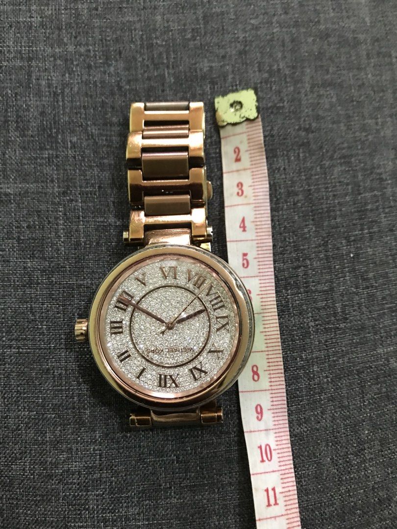 Michael Kors Ladies watch original (Category: Women's Watches) located in Manila. Submitted by rox.se (Listing ID 1465574451, Image 3). Description: Selling my preloved Mk watch for women Rose gold in color Minimal scratch and fade normal sa second hand Fits 7-8 inches wrist .