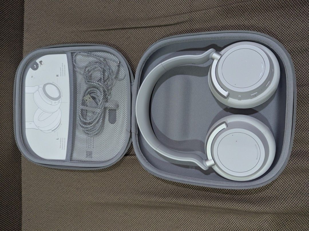 Microsoft Surface Headphones 2 (Category: Headphones & Headsets) located in Antipolo. Submitted by greyhoundt (Listing ID 1465494201, Image 1). Description: - Model: Microsoft Surface Headphones - Condition: Fully working, clean earpads and headband, well-maintained - Features: On-ear dial controls for volume and active noise cancellation (ANC) - Inclusions: Matching hard zip case and original braided USB charging cable - Storage: Always kept ins