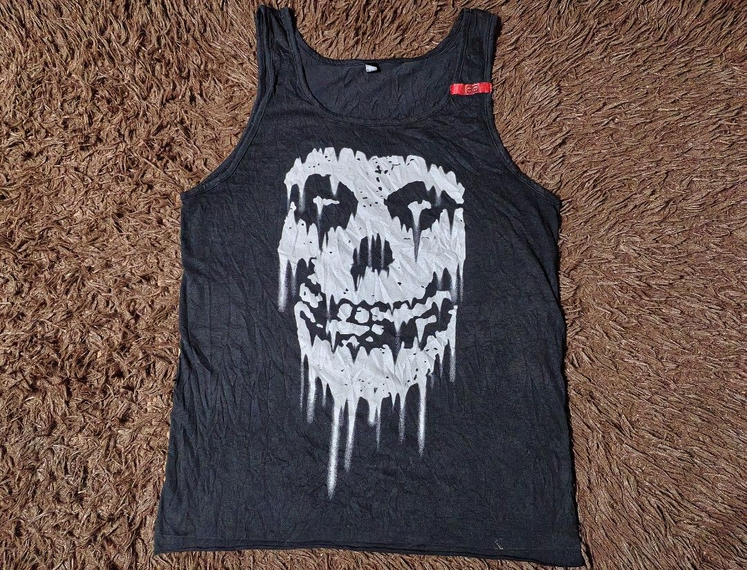 Misfits Tank top (Category: Tshirts & Polo Shirts ) located in San Juan City. Submitted by reddvelasquez4298 (Listing ID 1465455026, Image 1). Description: Misfits Tank Top 19 Width 27.5 Length Good Condition Issue bleach stains, loose stitching check photos. 😊 450 pesos PM.