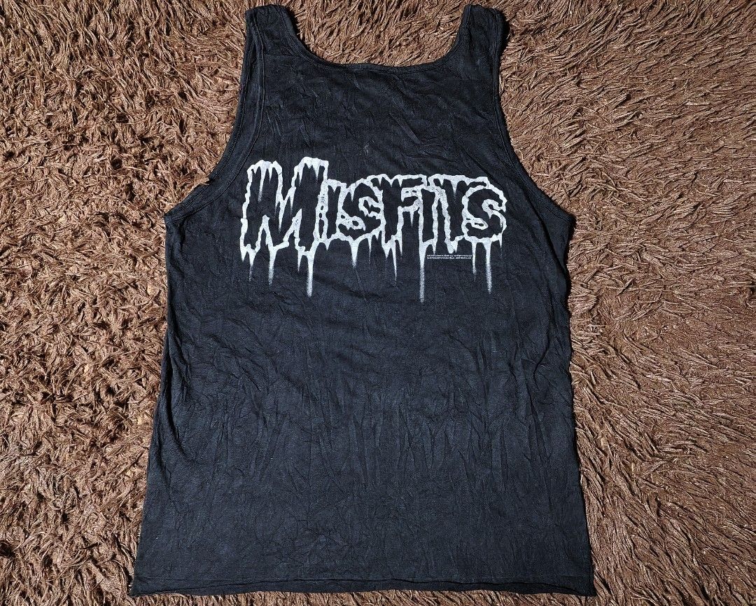 Misfits Tank top (Category: Tshirts & Polo Shirts ) located in San Juan City. Submitted by reddvelasquez4298 (Listing ID 1465455026, Image 2). Description: Misfits Tank Top 19 Width 27.5 Length Good Condition Issue bleach stains, loose stitching check photos. 😊 450 pesos PM.