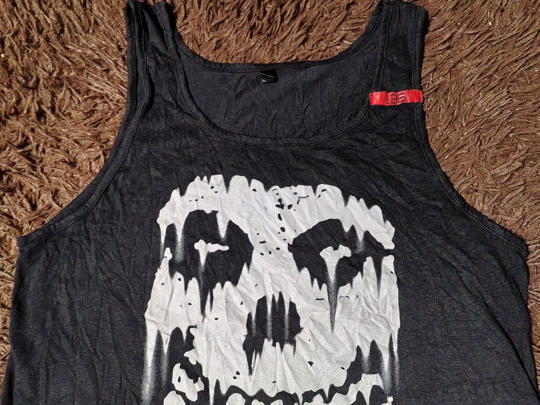 Misfits Tank top (Category: Tshirts & Polo Shirts ) located in San Juan City. Submitted by reddvelasquez4298 (Listing ID 1465455026, Image 3). Description: Misfits Tank Top 19 Width 27.5 Length Good Condition Issue bleach stains, loose stitching check photos. 😊 450 pesos PM.