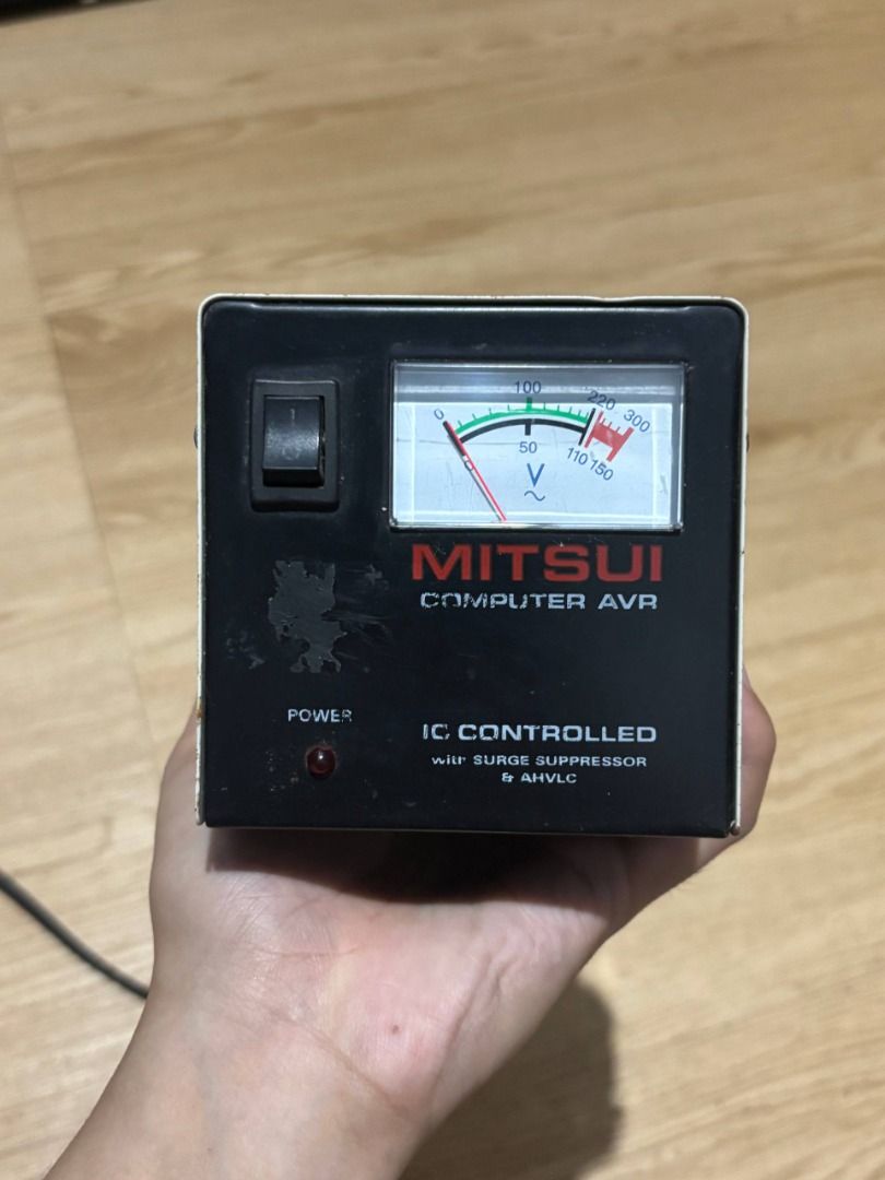MITSUI 500VA Computer AVR Voltage Regulator (Category: Electrical, Adaptors & Sockets) located in Rizal. Submitted by jjszenn (Listing ID 1465512711, Image 1). Description: Mitsui 500VA Computer AVR Voltage Regulator MAY BAWAS OR PRICE NEGOTIABLE SA SURE BUYER. - Capacity: 500VA max capacity - Voltage Input: 172V to 250V - Voltage Output: 220V (3 outlets) and 110V (1 outlet) - Front Panel: Analog voltmeter, power switch, and indicator light - Rea