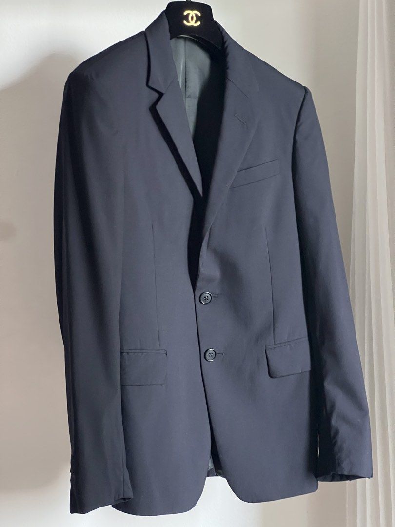 Miu Miu navy suit and pants (Category: Luxury Apparel) located in Quezon City. Submitted by raccoonfur (Listing ID 1465437774, Image 1). Description: Miu Miu deep navy wool blazer and trousers. Beautiful slim tailored silhouette that skims the body’s shape. A great sharp suit. No visible defects. Flat measurements: Blazer Pit to pit 45cm/17.75in Waist 39.5cm/15.6in Shoulders 42cm/16.5in Length 75cm/29.5in Sleeve inseam 44.5cm/17.5in Sleeve length