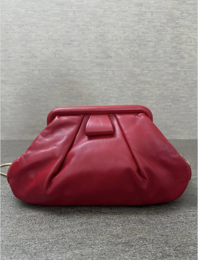 Miu Miu Red Sling Bag (Category: Luxury Bags & Wallets) located in Caloocan City. Submitted by lynchua4 (Listing ID 1465454296, Image 3). Description: Miu Miu pleated nappa soft frame clutch Unique rare bag Inclusion: Dust bag and card.