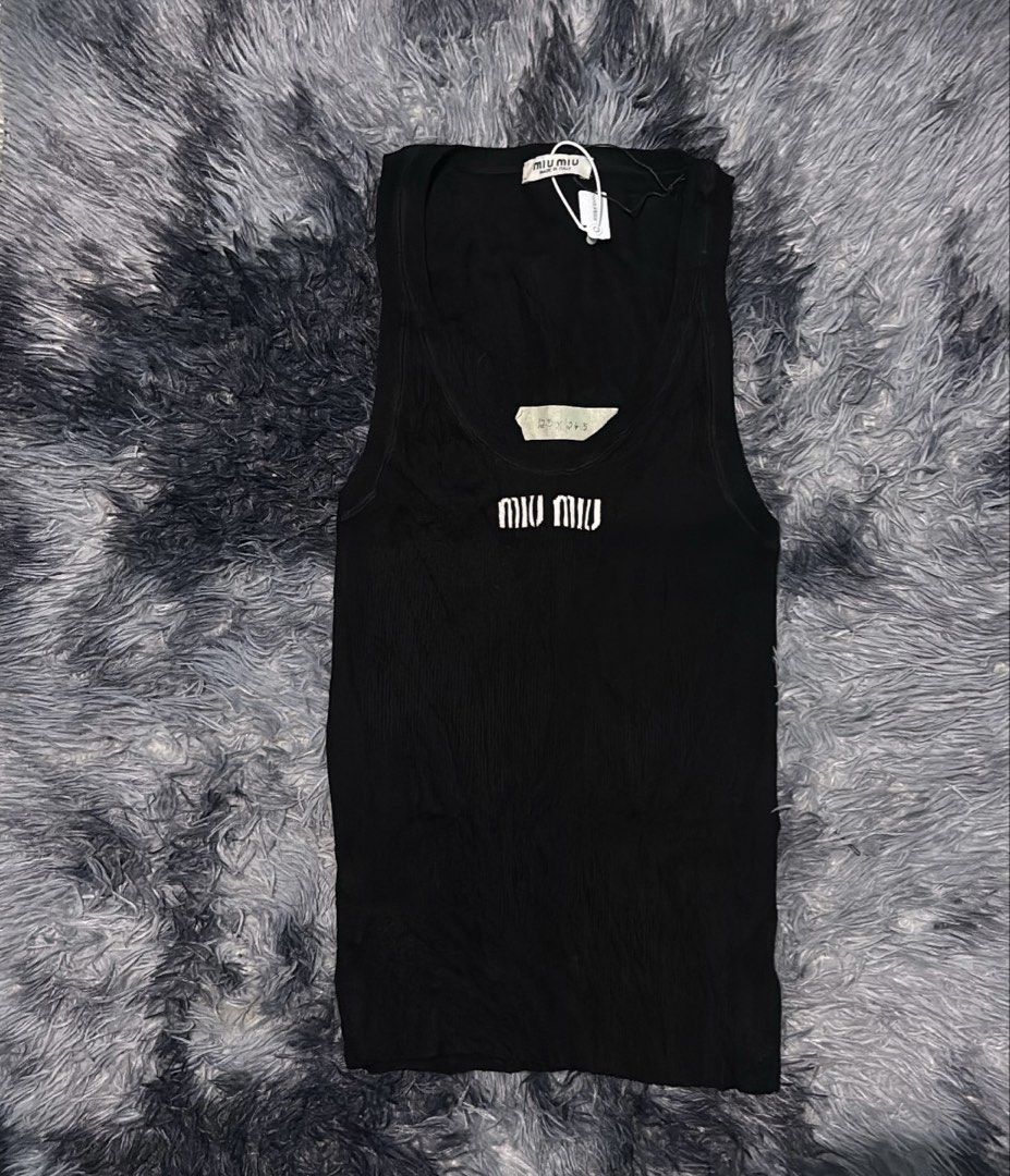 MIUMIU TOPS (Category: Sleeveless) located in Lubao. Submitted by aizgoodthrift (Listing ID 1465494171, Image 1). Description: Miumiu tops no issue good condition Dm me📩.