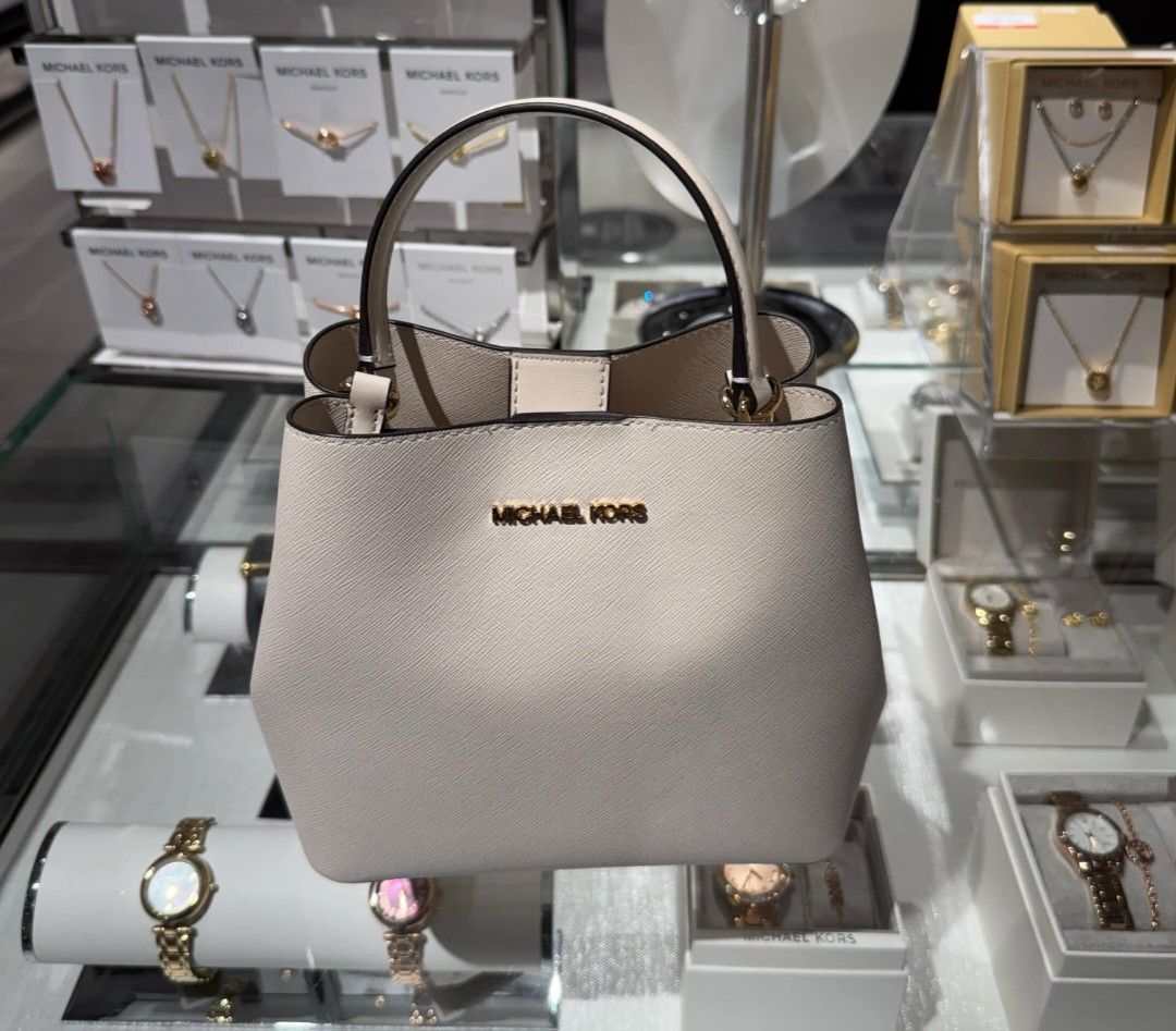 MK Bucket Bag (Category: Shoulder Bags) located in Quezon City. Submitted by missmaui (Listing ID 1465451896, Image 2). Description: Authentic comes with Paper Bag, Care card and Original Dust bag Japan bought used once.