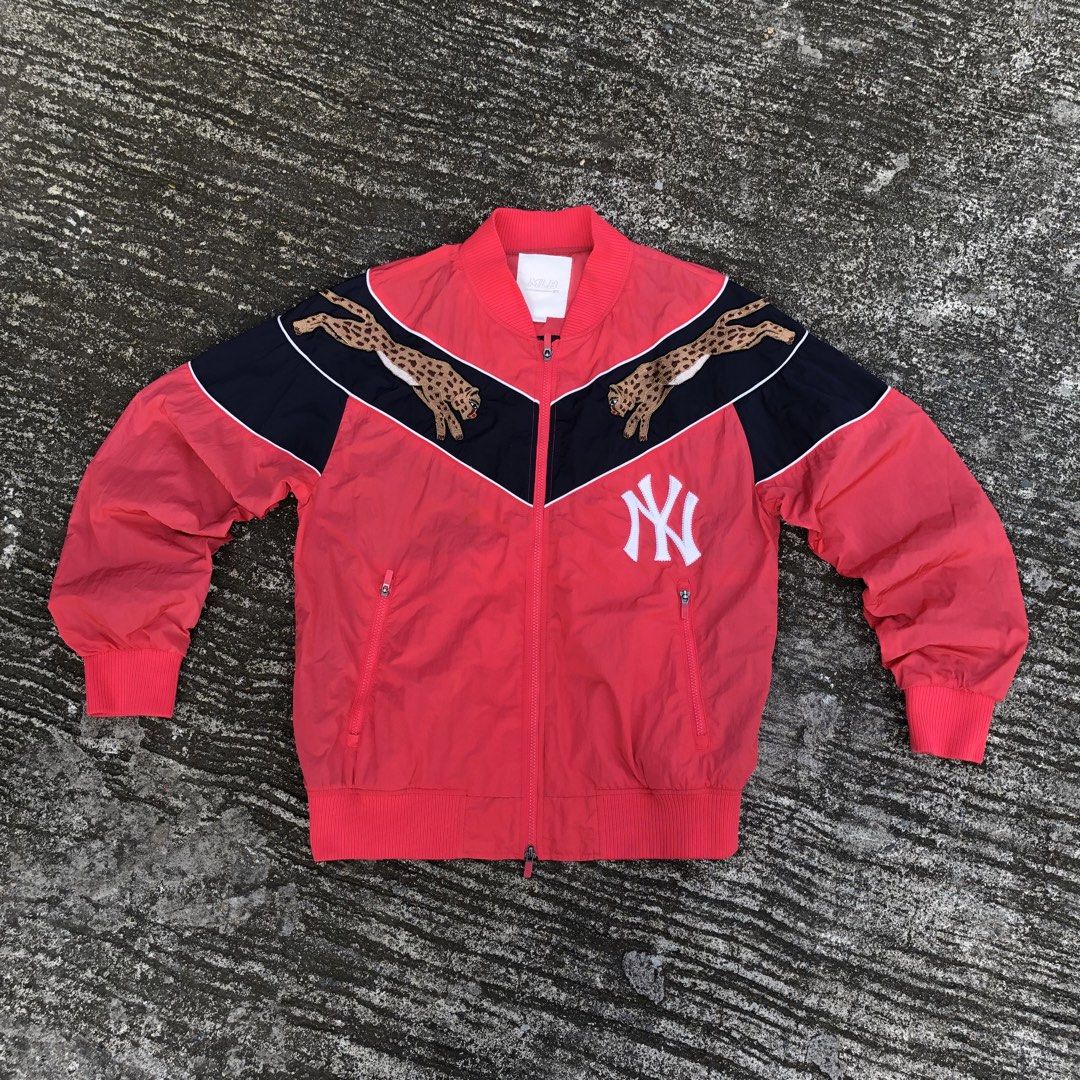 MLB New York Yankees Cheetah Bomber Jacket (Category: Coats, Jackets and Outerwear) located in Manila. Submitted by kelll08 (Listing ID 1465539231, Image 1). Description: - Authentic MLB New York Yankees jacket in red and dark blue - Eye-catching cheetah embroidery across the chest panel - Classic white Yankees logo on the lower front - Comfortable ribbed collar, cuffs, and hem - Secure front zip closure with zippered side pockets - Size: L (100)