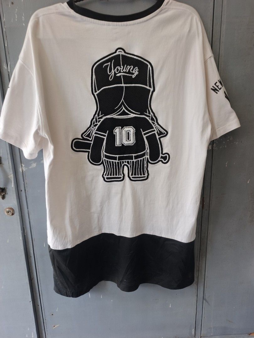 MLB T-shirt (Category: Activewear) located in Odiongan. Submitted by thriftngo26 (Listing ID 1465395058, Image 2). Description: This is a white and black short-sleeve athletic t-shirt featuring the word "YOUNG" and the number "10" on the front.